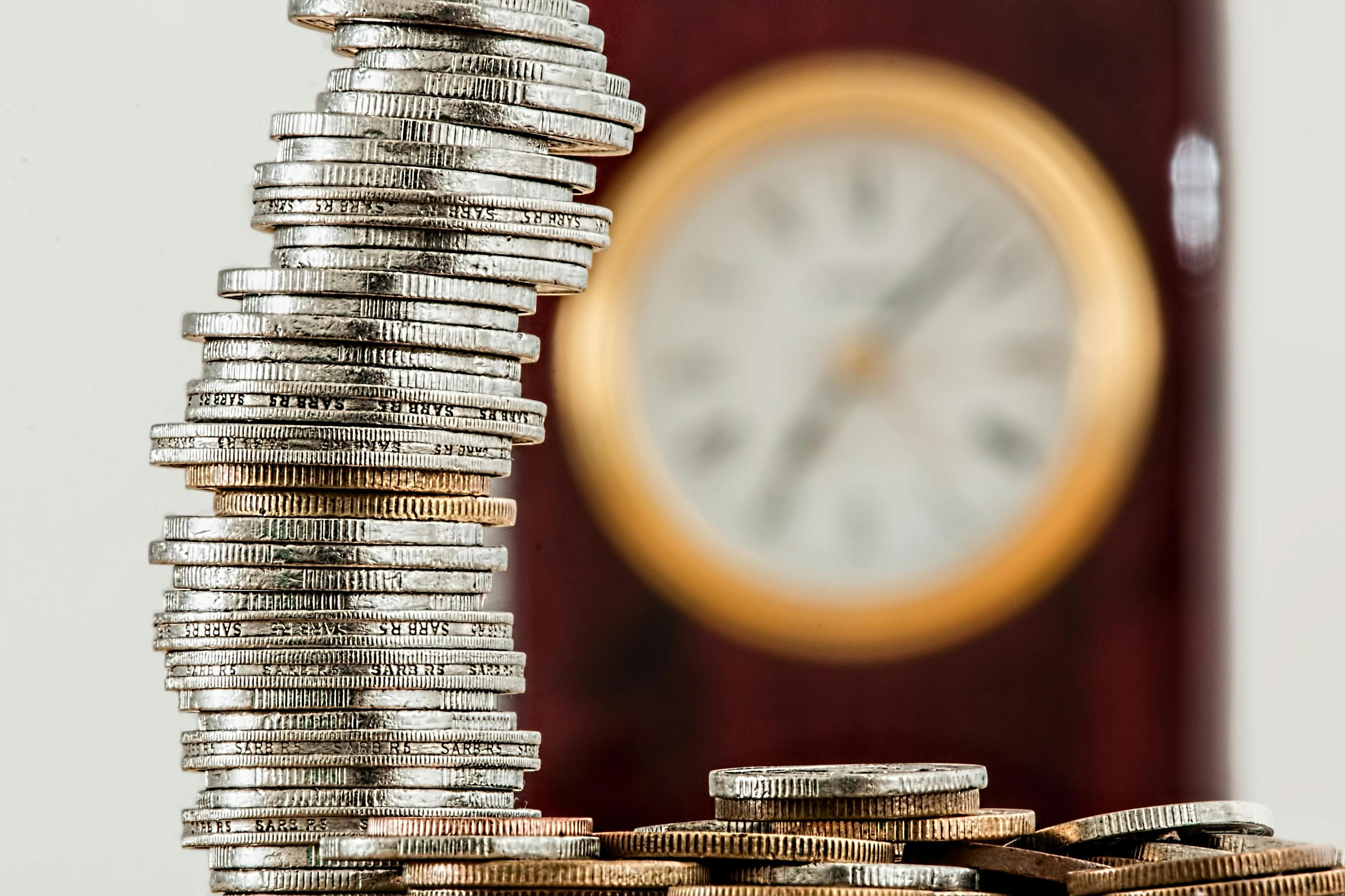 Coins and financial documents representing bond investments