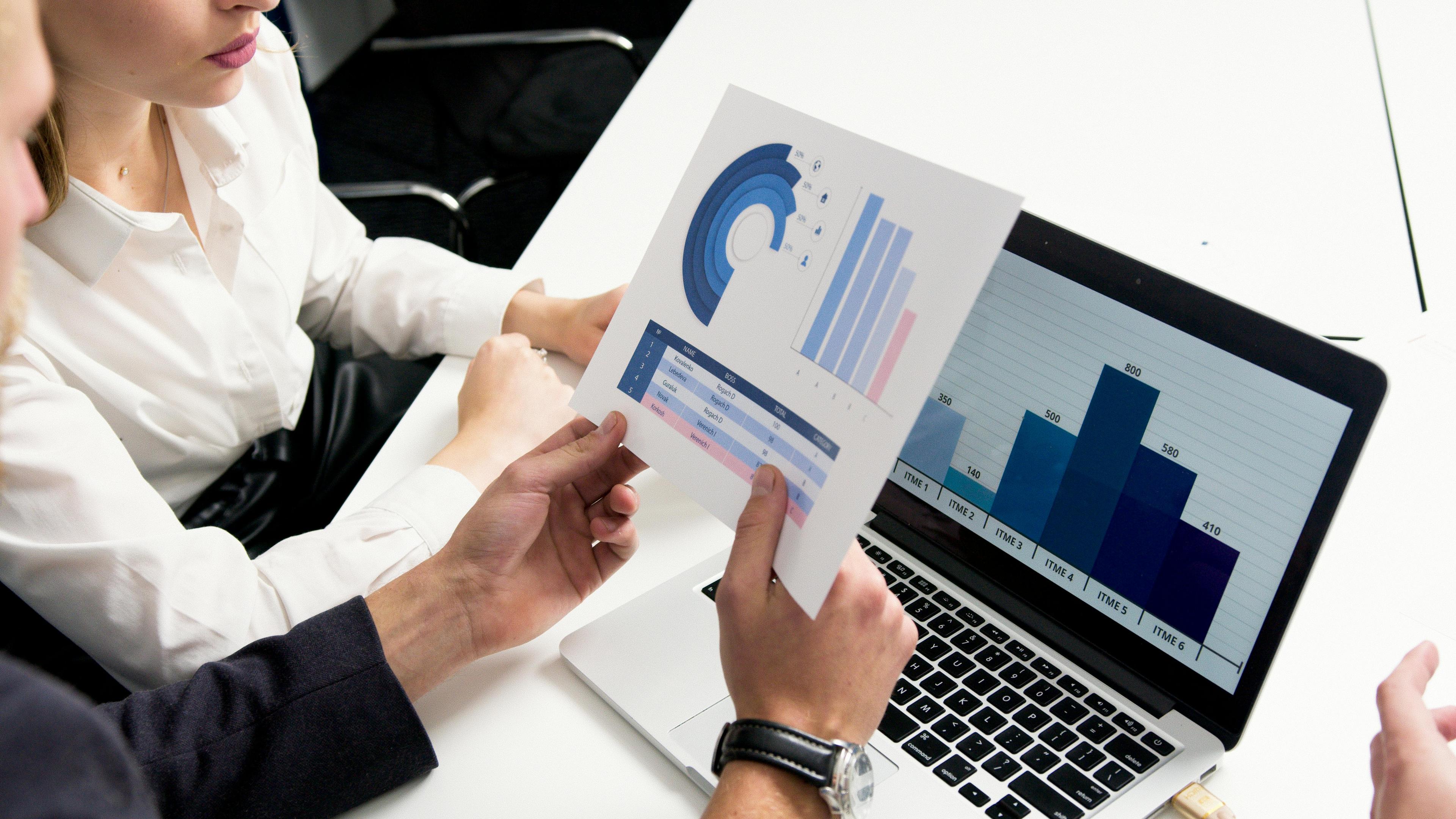 Stock market charts and graphs on a screen, representing equity portfolio advisory